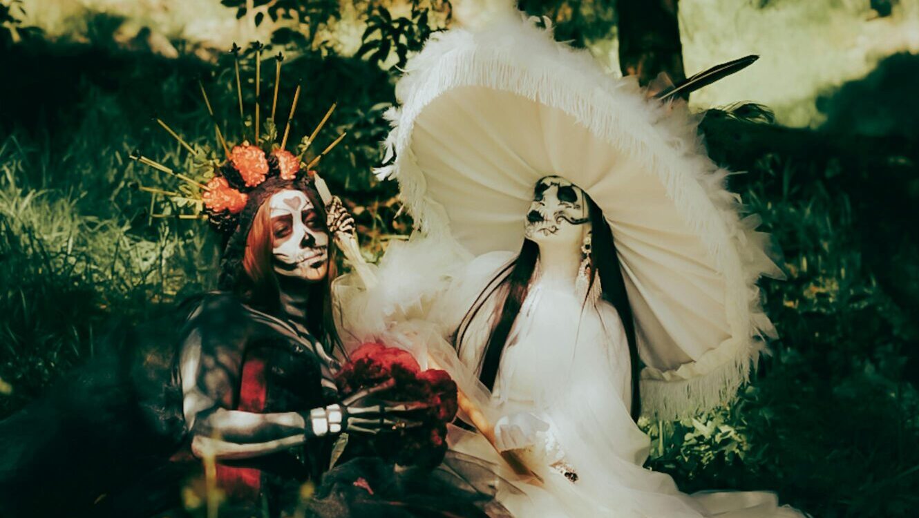Artistic skeletons in forest setting symbolizing the objective reality of the caregiver burden and happiness myth.